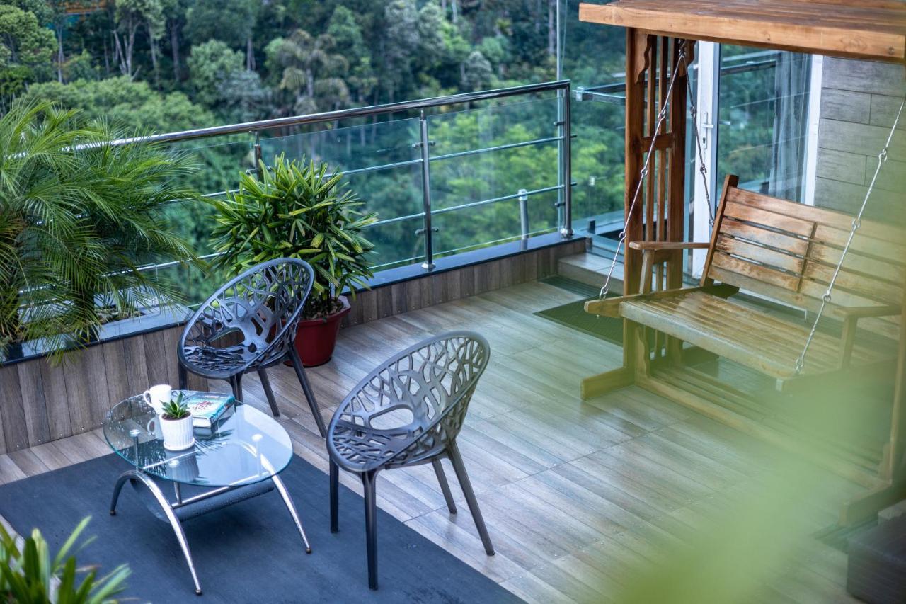 The Panoramic Getaway Hotel Munnar Eksteriør billede A balcony